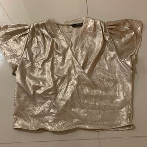 Shimery silk blouse golden color